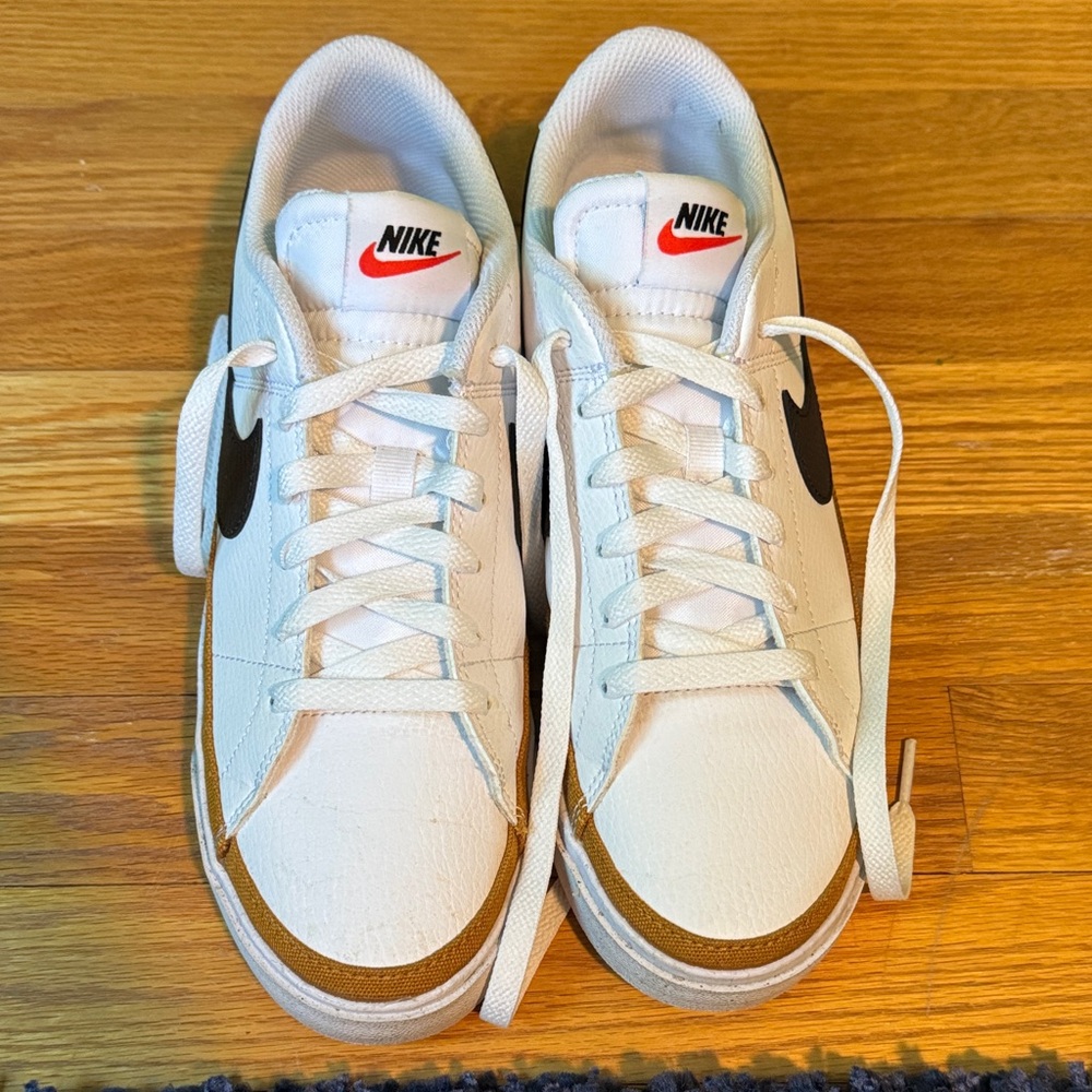 Nike White Sneakers with Black Swoosh and Brown Trim